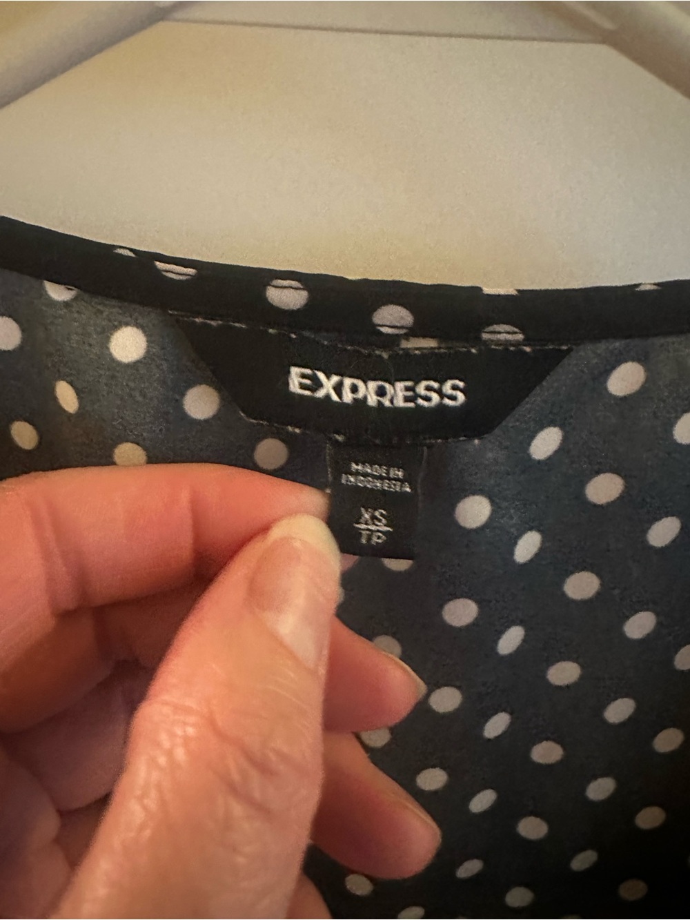 Express Black Polka Dot Zip-Front Top - Picture 2 of 16